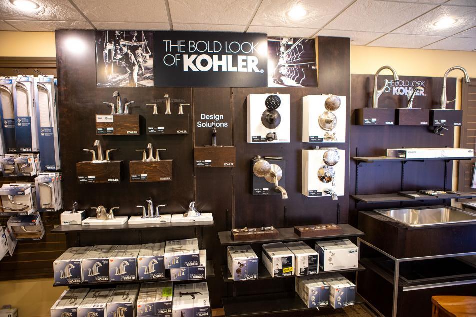 Kohler faucets and shower heads on display at McGann Building Supply
